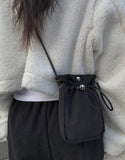 Taegi string mini cross bag