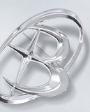 metal symbol brooch
