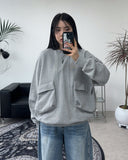 Poise over big pocket sweatshirt