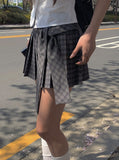 Chete Knot Check Pleats Mini Skirt