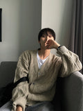 Cable Koshiharu Semi-over Cardigan