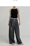 Color matching low strap wide slacks