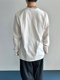 Roun Stripe Warmer Long Sleeve