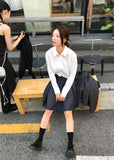 UNTAMED PLEATS SKIRT