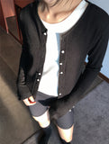 TWISTED BUTTON CARDIGAN