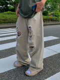 Neutral Beige Destroyed Denim Jeans