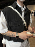 DISCERNMENT's made denim crop vest