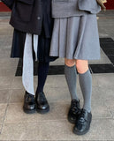 COZY PLEATS MIDI SKIRT