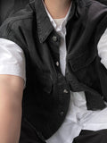 DISCERNMENT's made denim crop vest