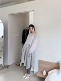 FRONT POCKET UNBAL SKIRT