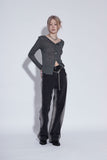 side washing black jeans