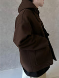 Norton over hooded coat