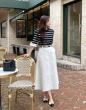 Tyne Cotton Two-Button Flare Long Skirt