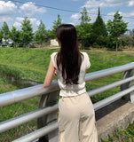 Punching Strap Ribbon Point Crop Short Sleeve Knit