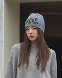 Triple cross rivet beanie