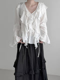 Plumel Ruffle V-Neck Blouse