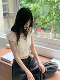 Illum Embroidery Punching Slit Cropped Short Sleeve Blouse