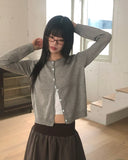 Nilla cut-out round neck button long-sleeved cardigan