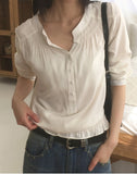 [MADE] Moan henley neck button shirring blouse