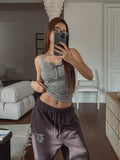 Folded ribbed snap sleeveless shirt