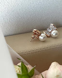 Meke Pearl Cubic Ribbon Earrings