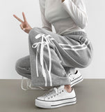 Sporty line ribbon point wide fit banding pants
