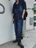 Incision circle washing denim pants