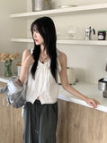 Coffin punched lace string sleeveless blouse