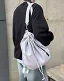 Sling bucket backpack