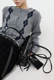 Dangling buckle shoulder bag