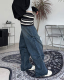 Pad snap button denim pants