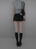 Reco coated leather shorts