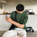 Cable knit short sleeve henry neck ver