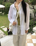 Any loose fit gauze see-through shirt