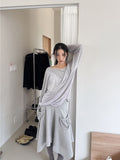 FRONT POCKET UNBAL SKIRT