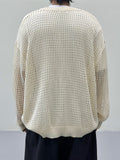 Demon punching knit