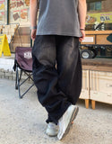 Ete diagonal curve denim pants