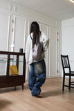 tin brush over denim