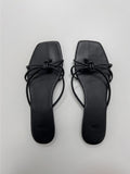 Raebeu Twist Flip Flops Sandals