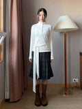 CHECK LOOP PLEATS SKIRT