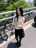 SHOULDER HOLE SLEEVELESS