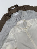Renne Belted Loose-Fit Blouse