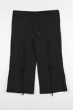 String ribbon over pants
