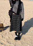 A BLACK CHECK SKIRT
