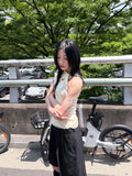 SHOULDER HOLE SLEEVELESS