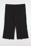 String ribbon over pants