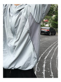 Solin Mesh Hood Windbreaker