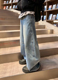 Curved washed darts denim