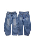 Curved washed darts denim