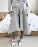 FRONT POCKET UNBAL SKIRT